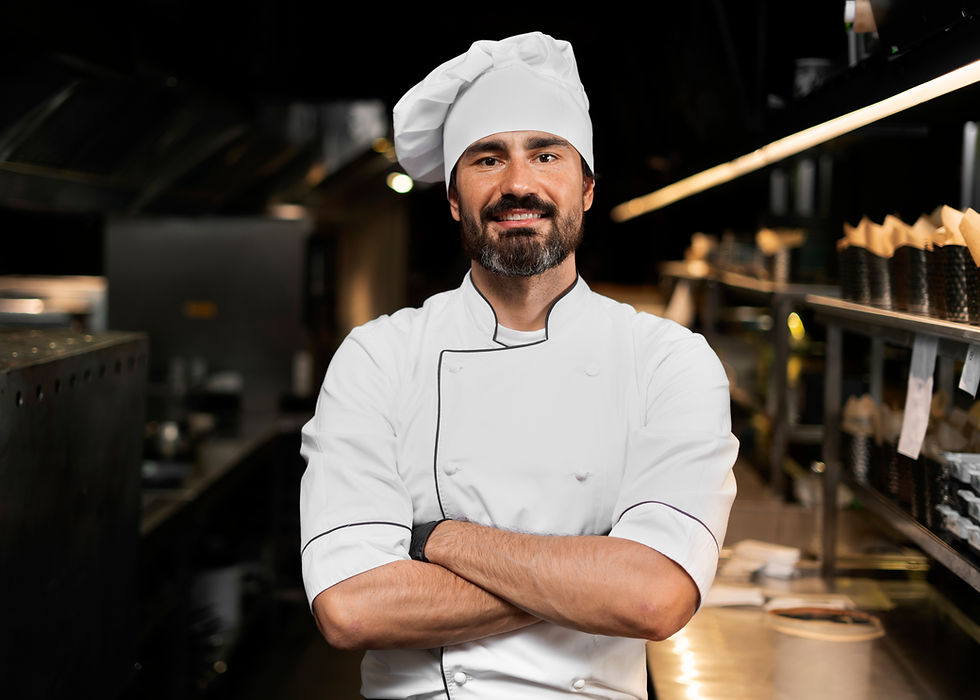 chef-cooking-kitchen-while-wearing-professional-attire.jpg