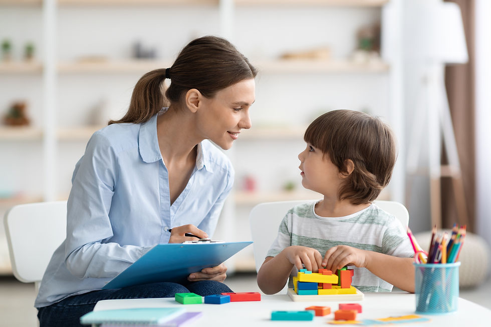 professional-woman-psychologist-exercising-with-little-boy-checking-readiness-school-takin