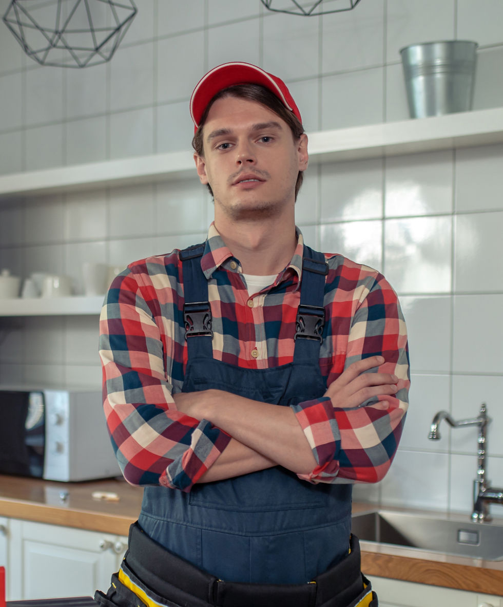 tranquil-repairman-posing-camera-client-apartment_edited.jpg