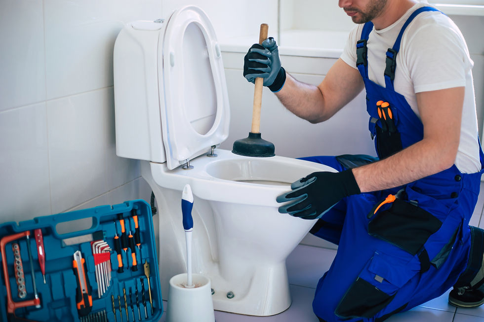 professional-plumber-uniform-is-repairing-toilet-bowl-domestic-bathroom-with-help-tools.jp