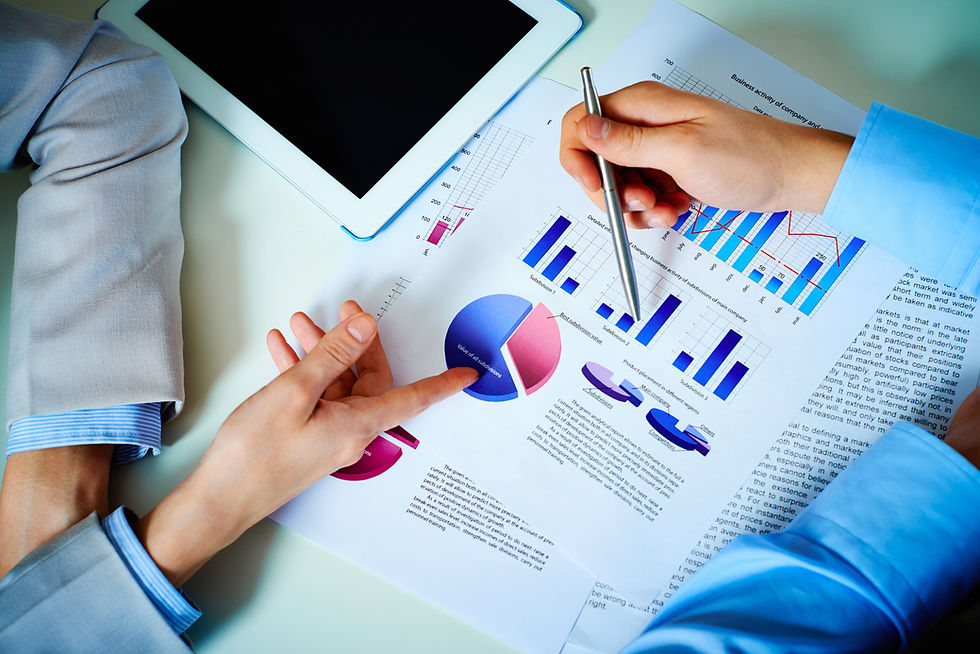 close-up-hands-with-financial-charts-business-meeting.jpg