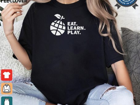 Ayesha Curry Wearing Eat Learn Play t shirt