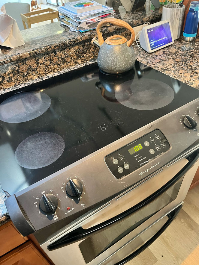 After cleaning view of Stove, thoroughly cleaned and refreshed by Spotless Homes' professional cleaners.