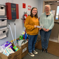 2021 Rogers Scholar Emily Mays delivers donated items to the homeless