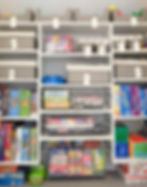 Labeled storage baskets in a playroom