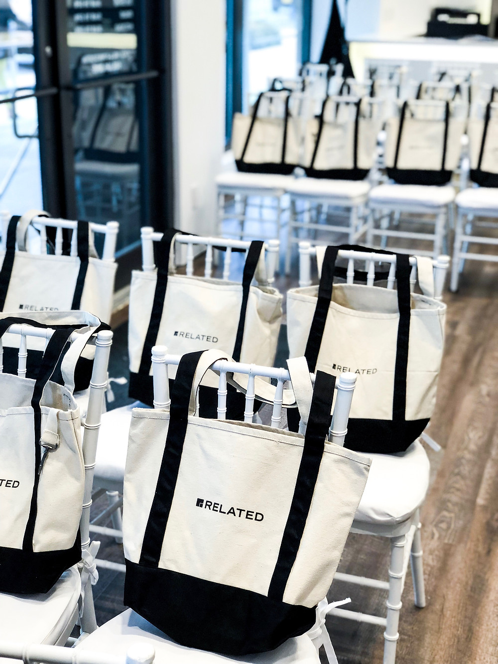 bags placed on event chairs