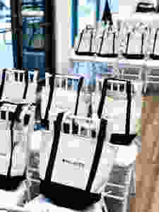 bags placed on event chairs