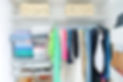 Organized closet with colorful clothing