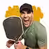 out.playing.pickleball.avif