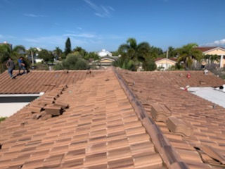 Green Leaf Roofing LLC finishing tile roof installation.JPG