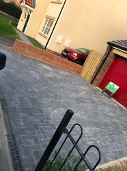 Dark grey block paving driveway, modern house, red car, Bishop Auckland.
