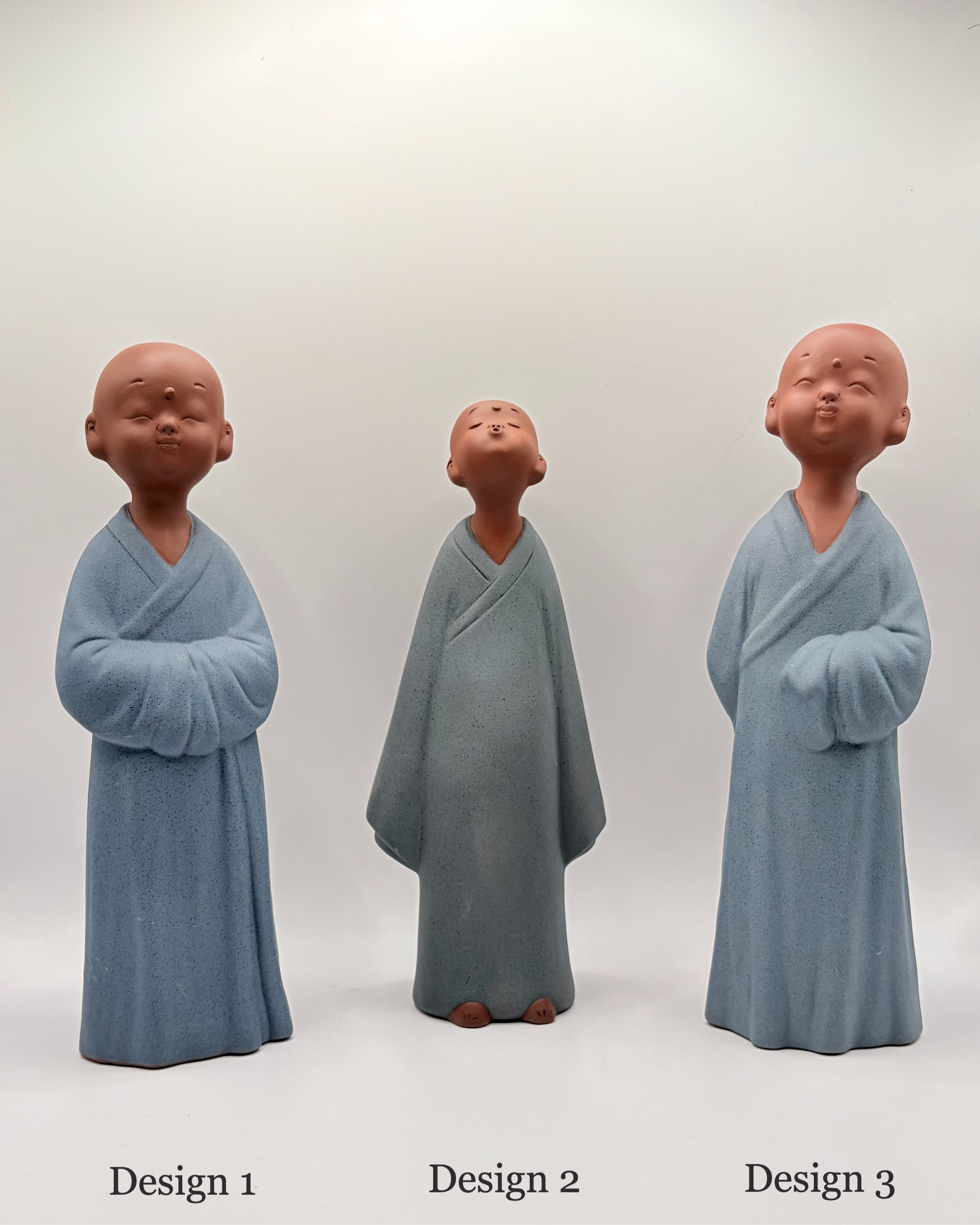 Assorted Handmade Yixing Purple Clay Monk Figurines