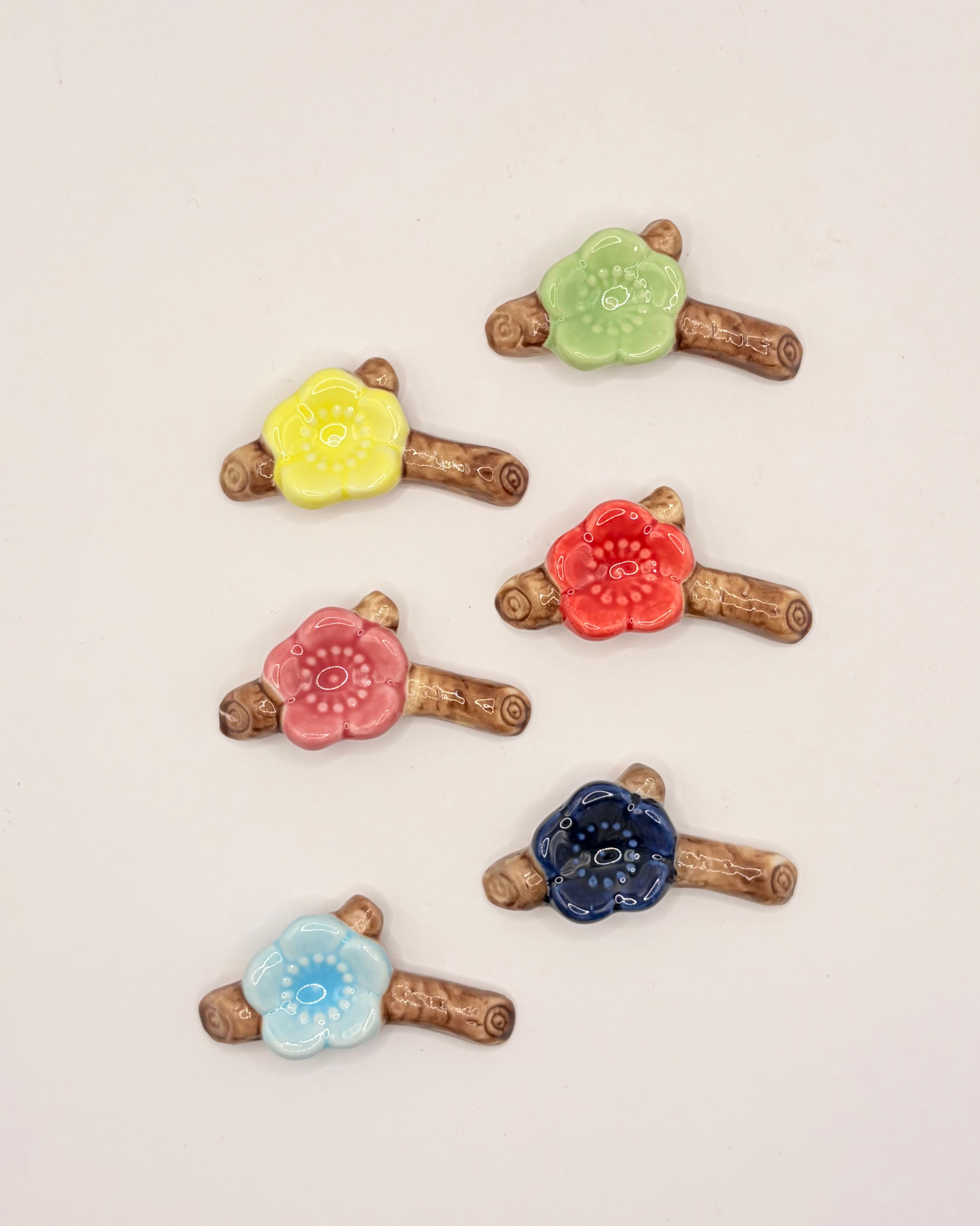 Handmade Porcelain Plum Blossom Chopstick Rests with Hand-Painted Detail