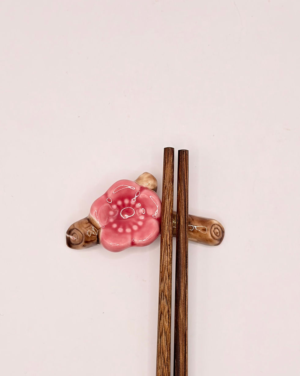 Thumbnail: Handmade Porcelain Plum Blossom Chopstick Rests with Hand-Painted Detail