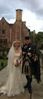 Bride and piper on Terrace at Gean House