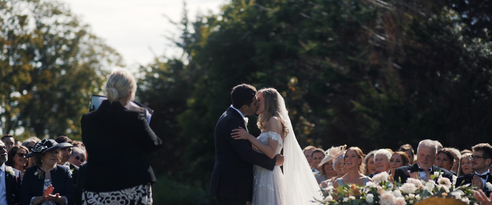 Newton Hall Wedding Film Outdoor Ceremony First Kiss.jpg
