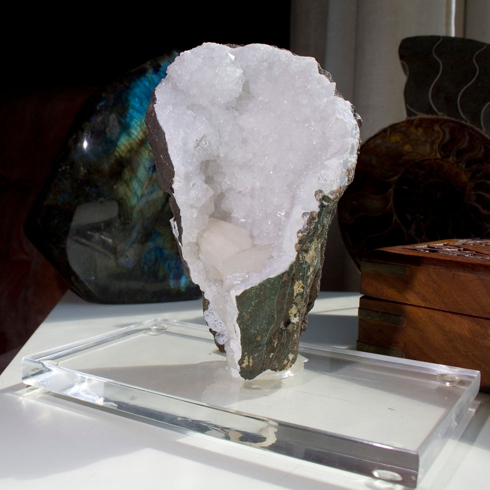 Thumbnail: natural Basalt matrix lined with sparkling crystals of Apophyllite surrounding two, touching, crystals of Stilbite.