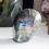 Thumbnail: This hand polished Labradorite free form features a yellow and blue flash across its entire face. Labradorite is a spectacula