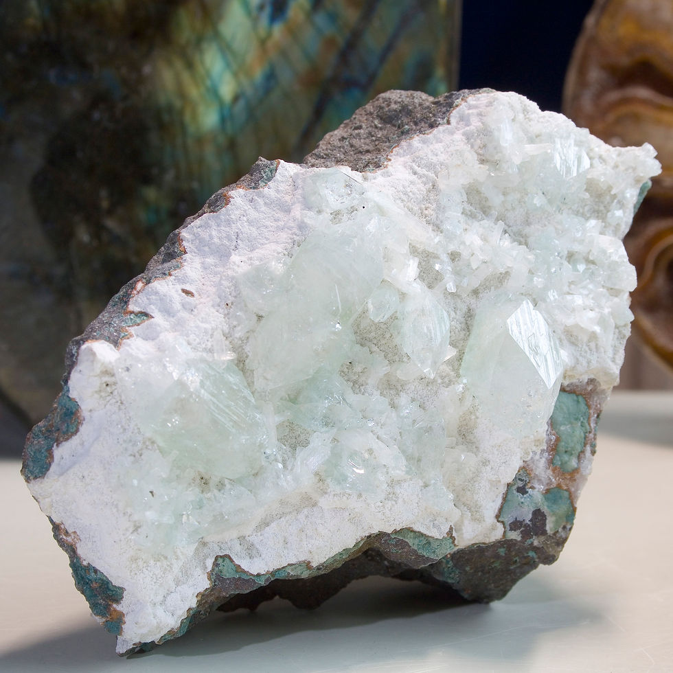 Light green super gemmy crystals of Apophyllite, many double terminated, are interspersed with miniatures blades of white Sti