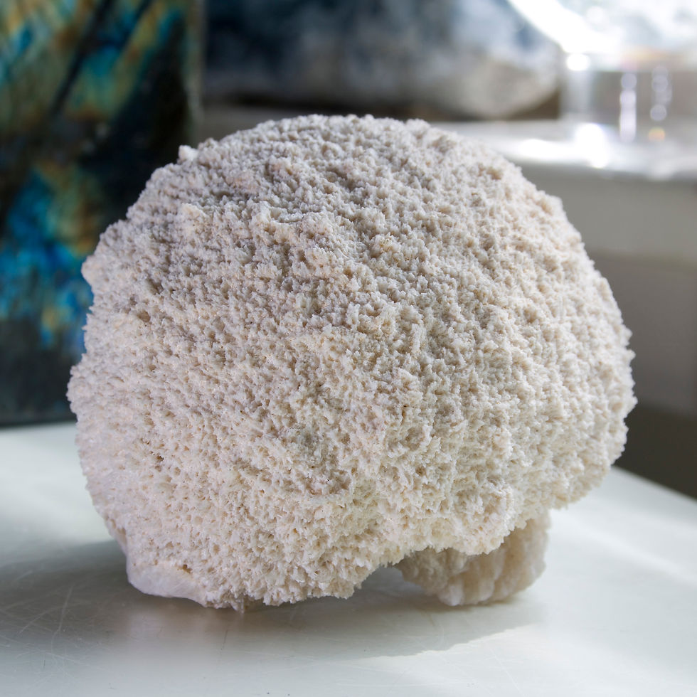 Thumbnail: The scale of this massive, rounded Mordenite crystal is truly impressive. Three smaller bursts of Stilbite form a base