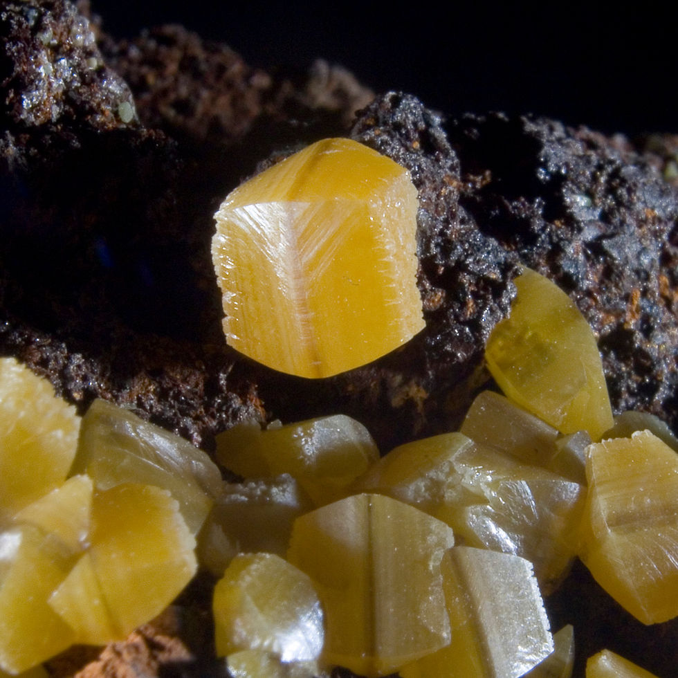 Thumbnail: Two-tone "Sandwich" Wulfenite crystals of the Ojuela Mine. Bright yellow crystals of Wulfenite. Studio Mineralia