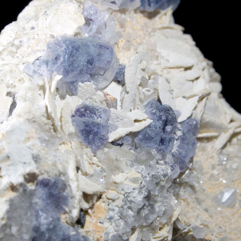 Thumbnail: Complex crystals of Fluorite are accompanied by a series of small scepters of Quartz.