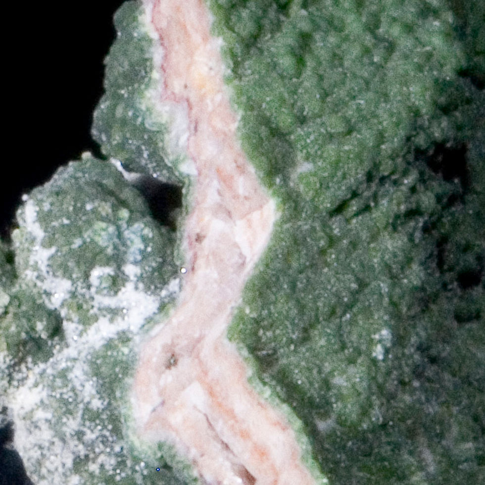 Thumbnail: Thin layers of pink matrix material support two-sided mineralization of both Duftite and Dolomite. One side is gently undulat