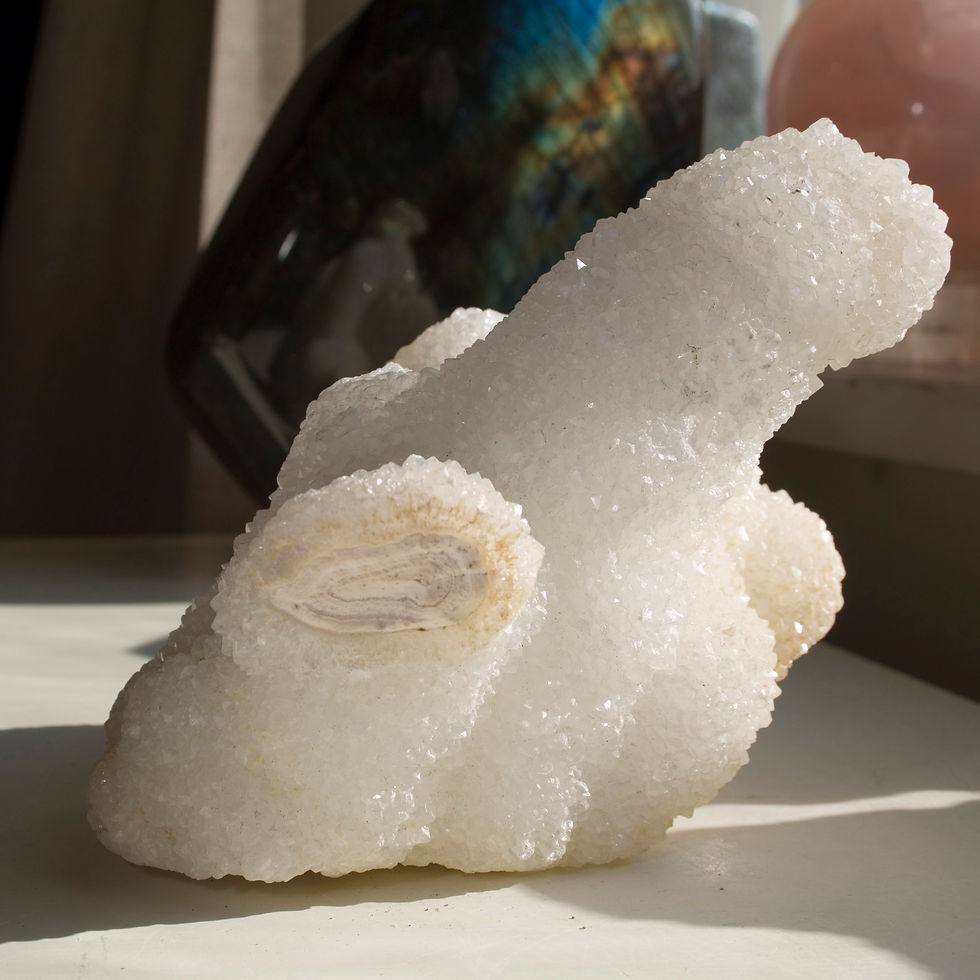 Thumbnail: This series of stalactites is beautifully concentric Chalcedony at its core, and covered in sparkling miniature crystals of Q