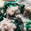 Thumbnail: Bright Green Malachite in its spectacular primary form. Sprays of Malachite line the peaks and valleys of this perfectly-pres