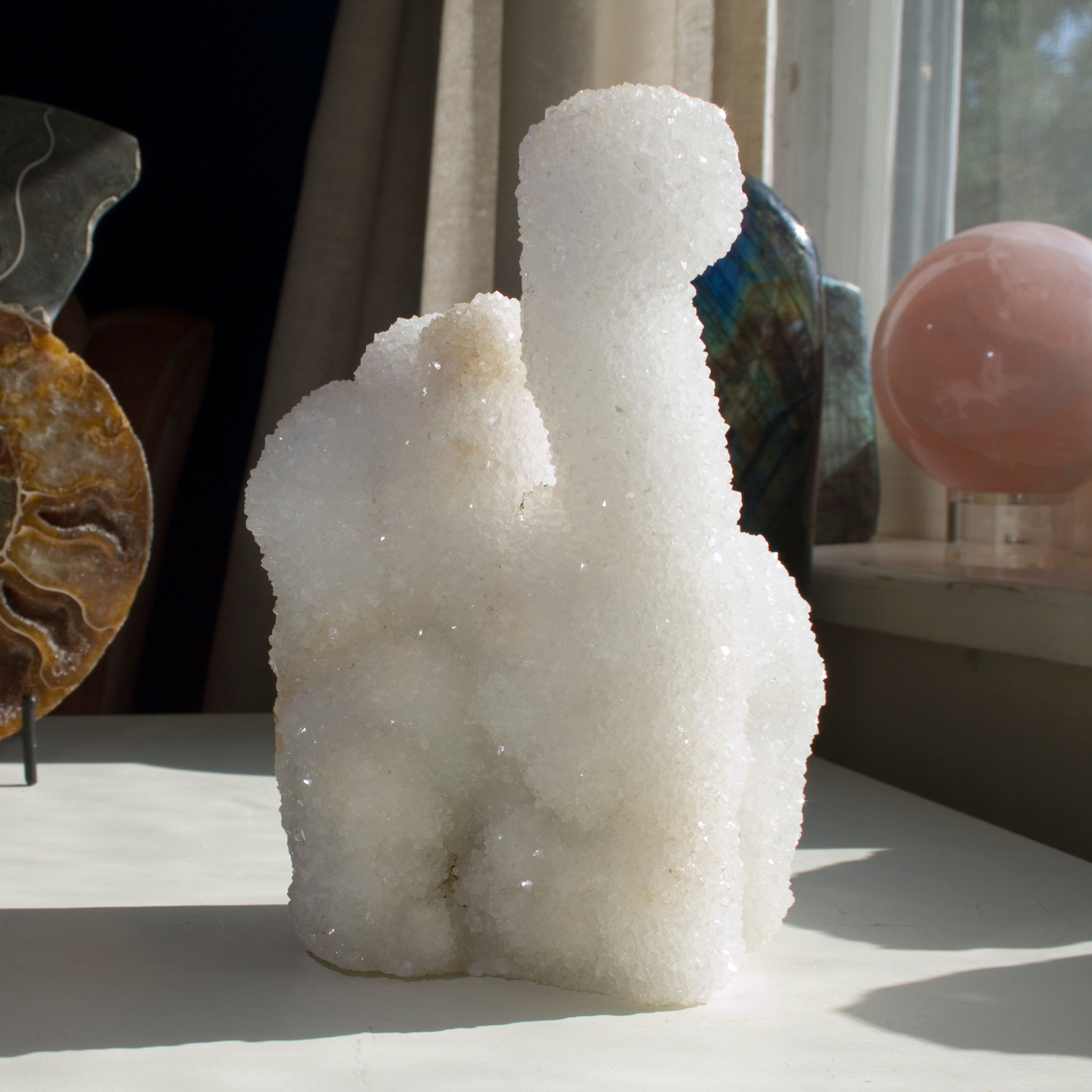 One of this series of freestanding Chalcedony stalactites looks like Dino. From the Flintstones, not The Rat Pack. The entire