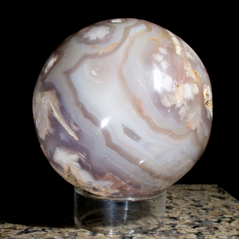 Agate is a complex, layered form of Chalcedony and Quartz that has been worked by sculptors for thousands of years. Theophras