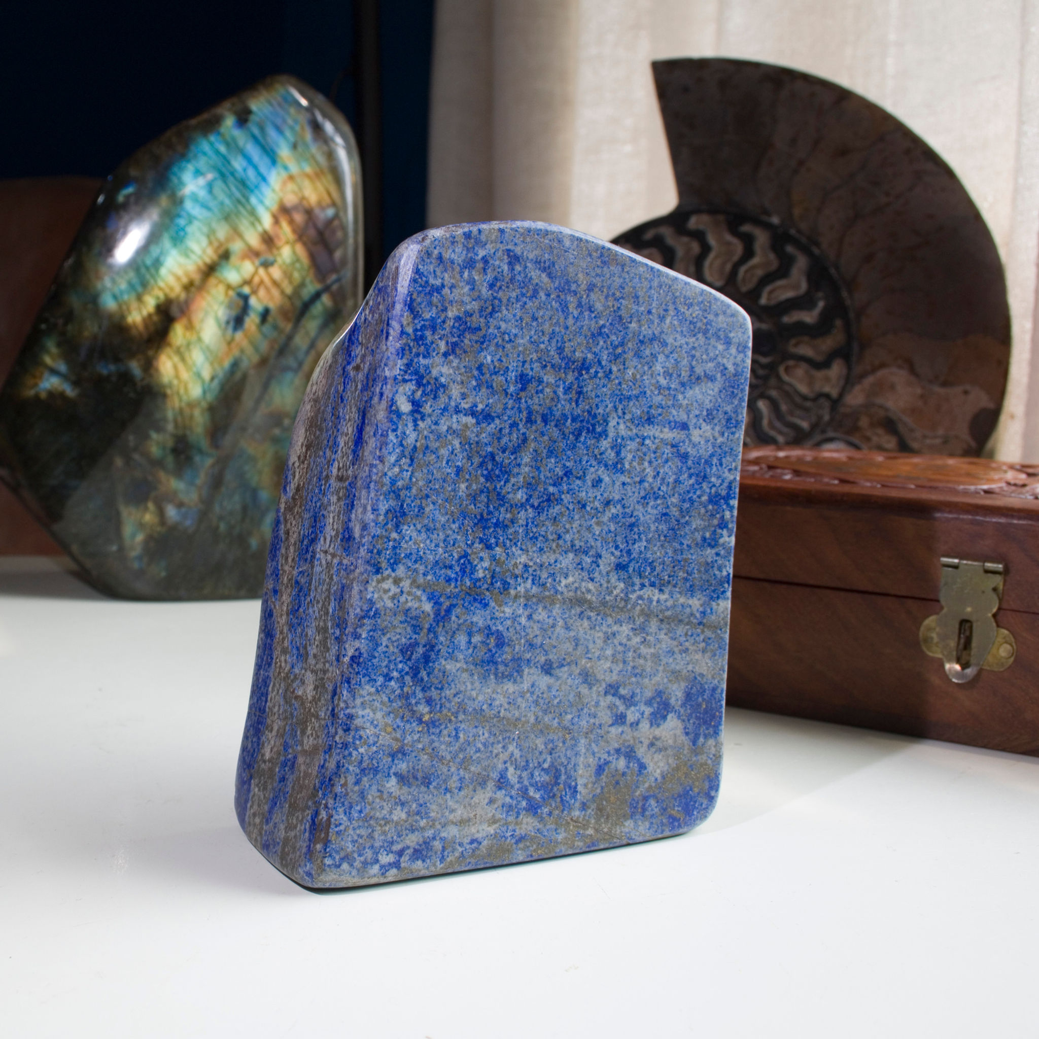 Polished Afghan Lapis Lazuli slab swirls with bands of white and sparkling golden Pyrite. Freestanding, hand polished and stu