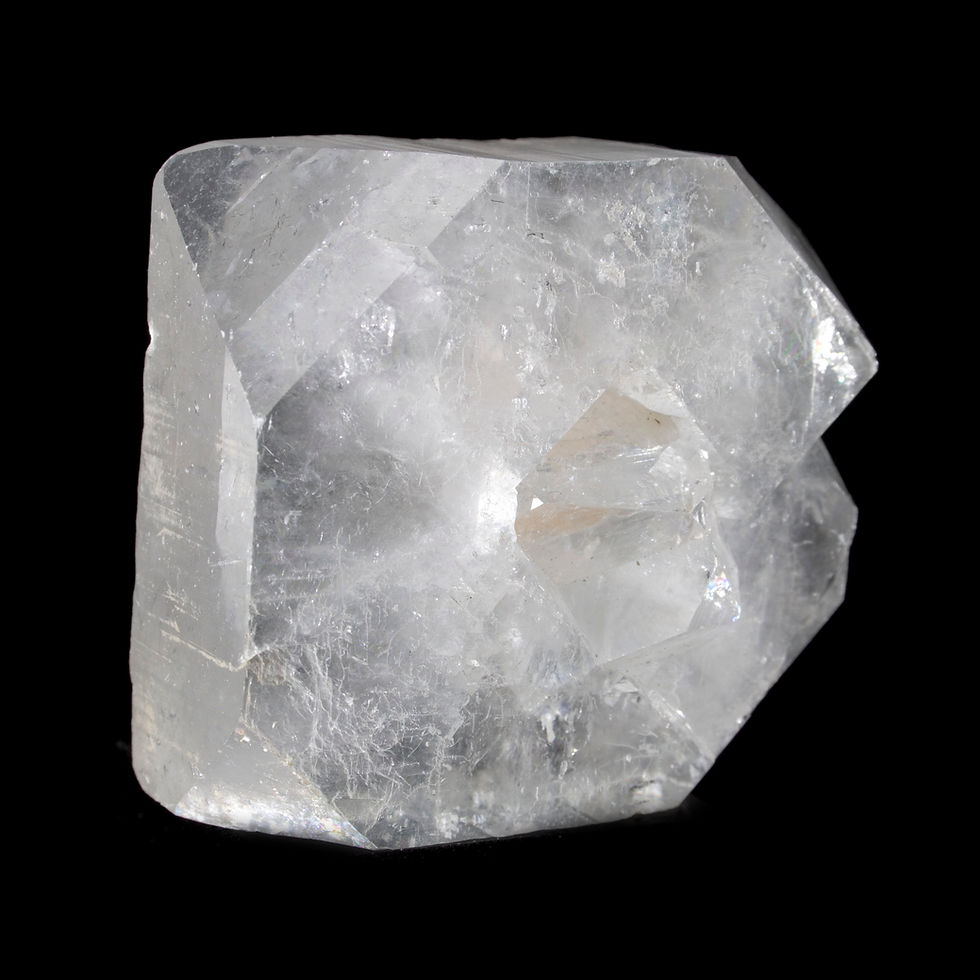 The natural cleavage plane of a large Apophyllite crystal, seperated the top, terminating, layer of the crystal cleanly creat