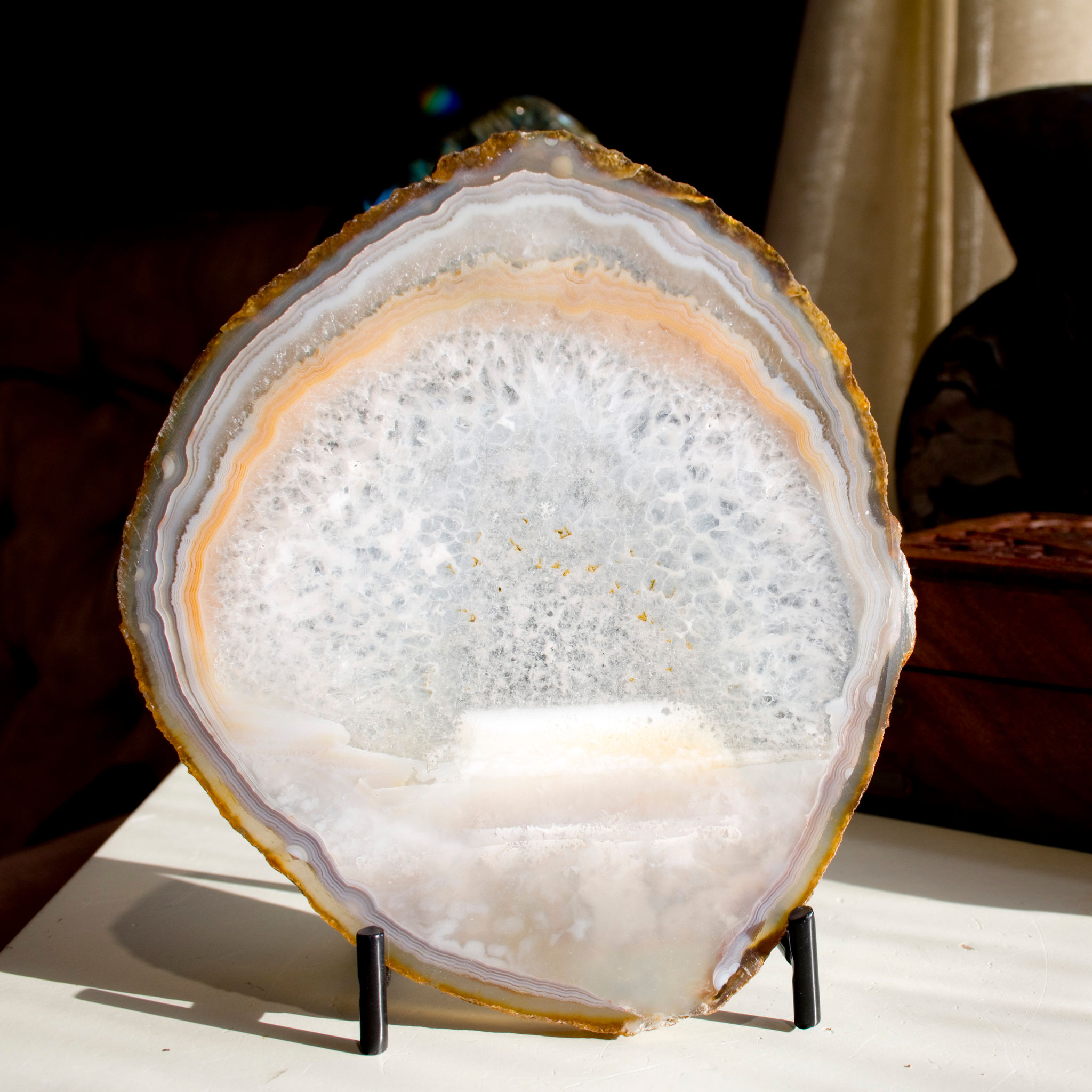 Agate, Nature's Stained Glass! Particularly picturesque thin, translucent banded Agate, stand included for an optimal display