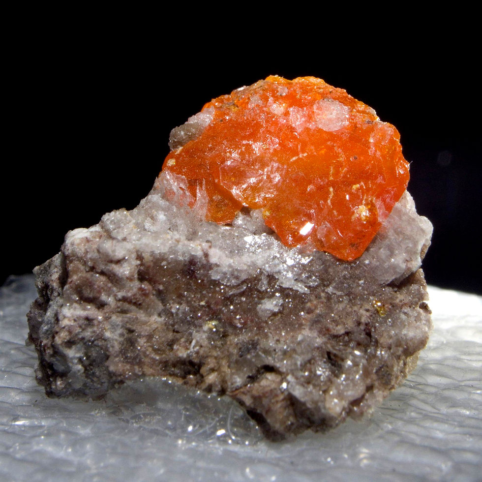 Wulfenite. Red Cloud Mine, La Paz County, Arizona, USA. A large, chunky, funky, 12 mm crystal of Wulfenite with some secondar