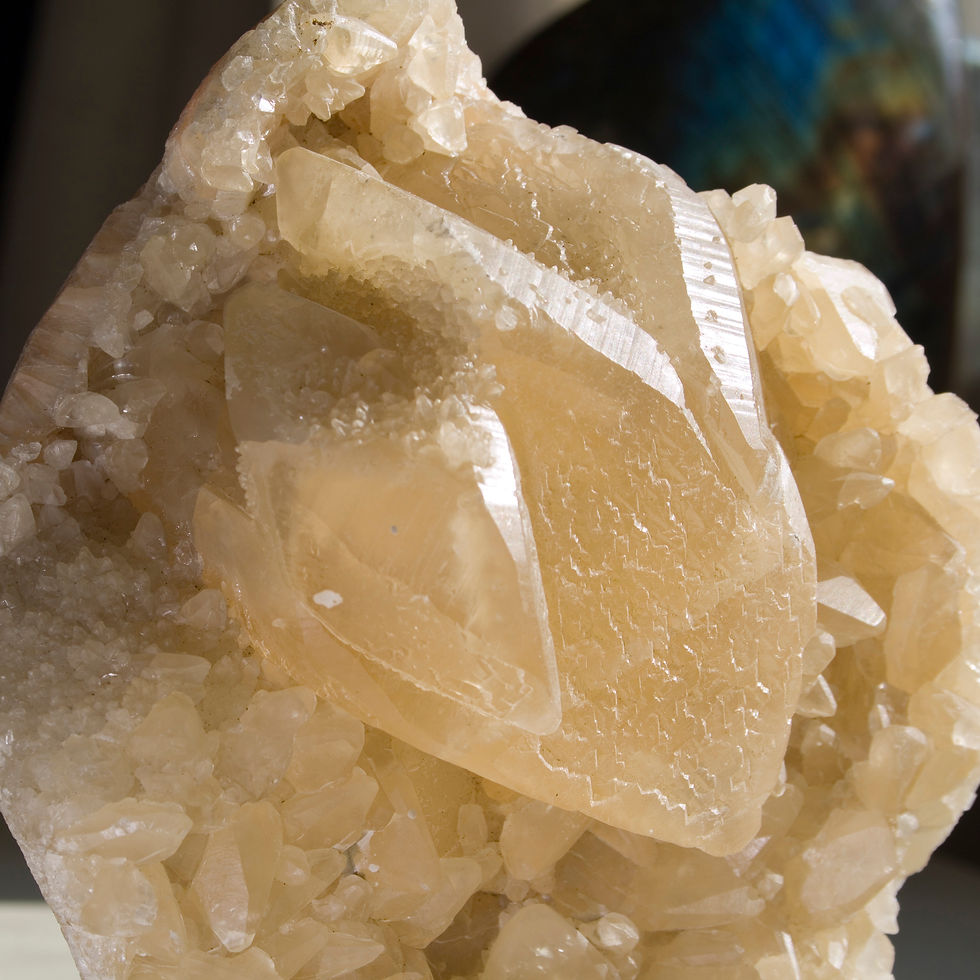 Crystals of Calcite increase in scale until they reach a three-inch, triple terminated, nicely etched crystal. Calcite