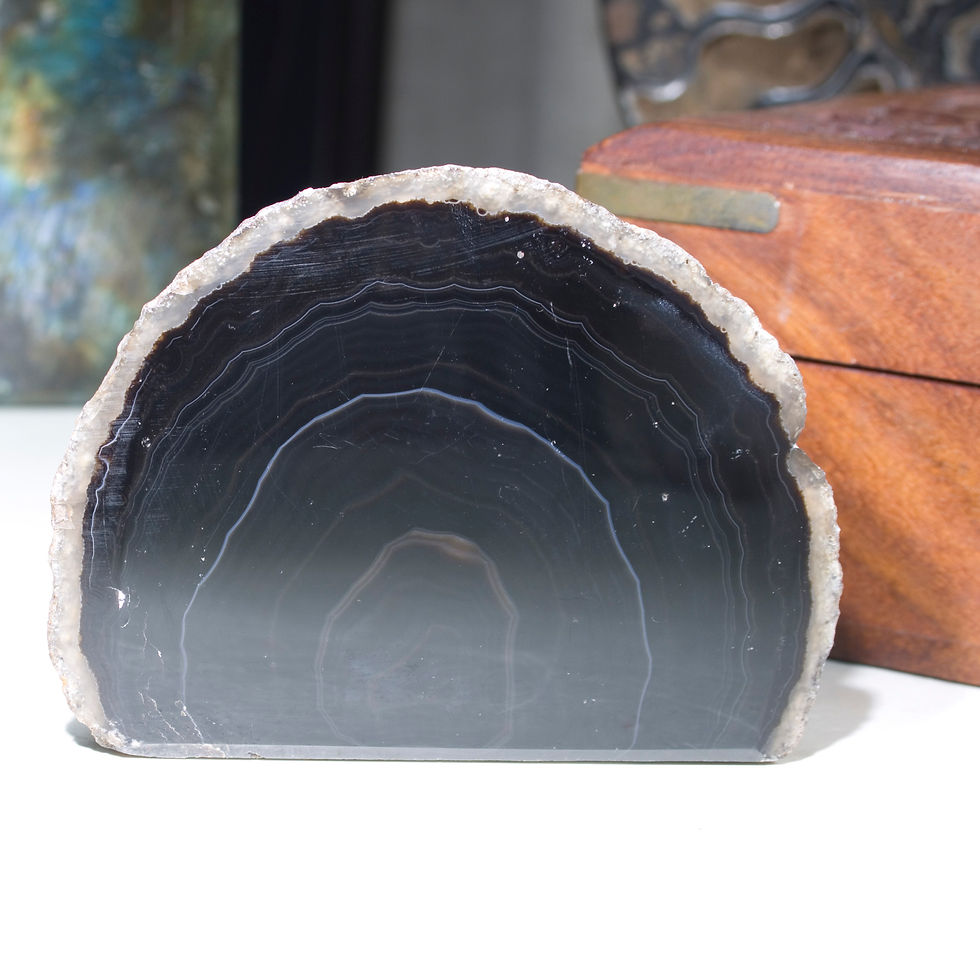 One side of this perfectly patterned Banded Agate is polished to reveal the concentric patterns inside, the reverse is left i