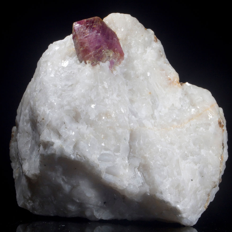 Thumbnail: A nicely positioned, terminated and highly fluorescent Ruby crystal on a matrix of Marble. Pakistan.  Studio Mineralia