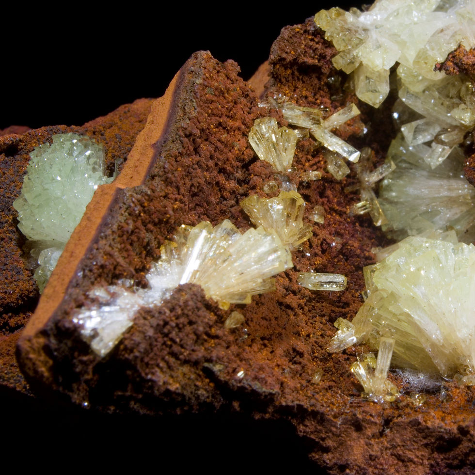 Thumbnail: A variety of gemmy terminated Adamite crystals across two distinct spaces within the Limonite matrix. The limonite matrix fra