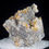 Thumbnail: A fantastic miniature from a legendary find! The Chalcedony/Quartz covered Wulfenite of the Finch/Barking Spider Mine is ver