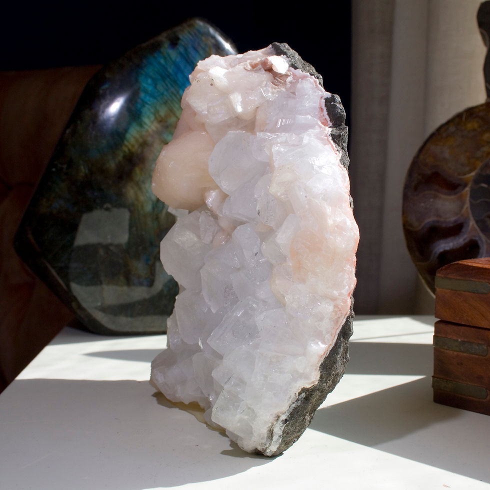 Thumbnail: Dozens of large, icy clear cubic crystals of Apophyllite perfectly accented by bright pink crystals of Stilbite of multiple s