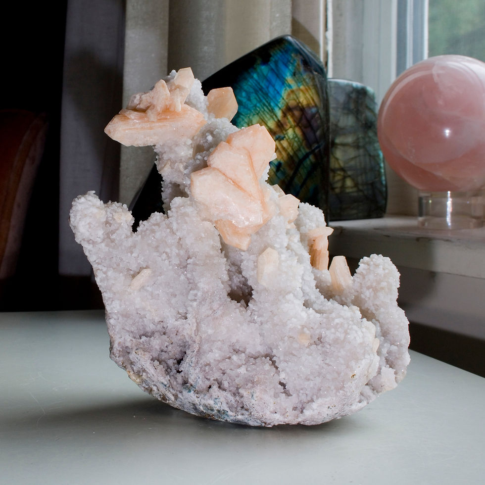 A compelling stand of sparkling Chalcedony stalactites highlighted by multiple crystals of Pink Peach Chalcedony. A perfect 3