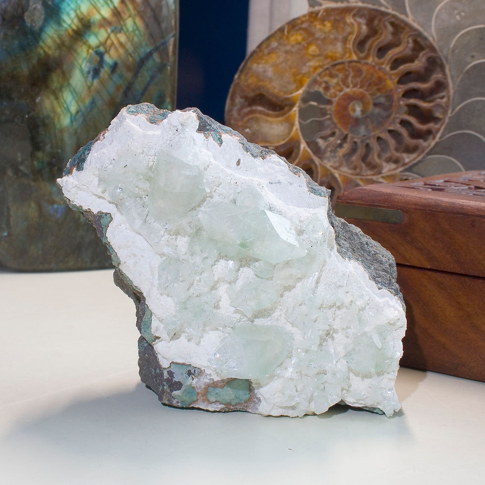 Thumbnail: Light green super gemmy crystals of Apophyllite, many double terminated, are interspersed with miniatures blades of white Sti