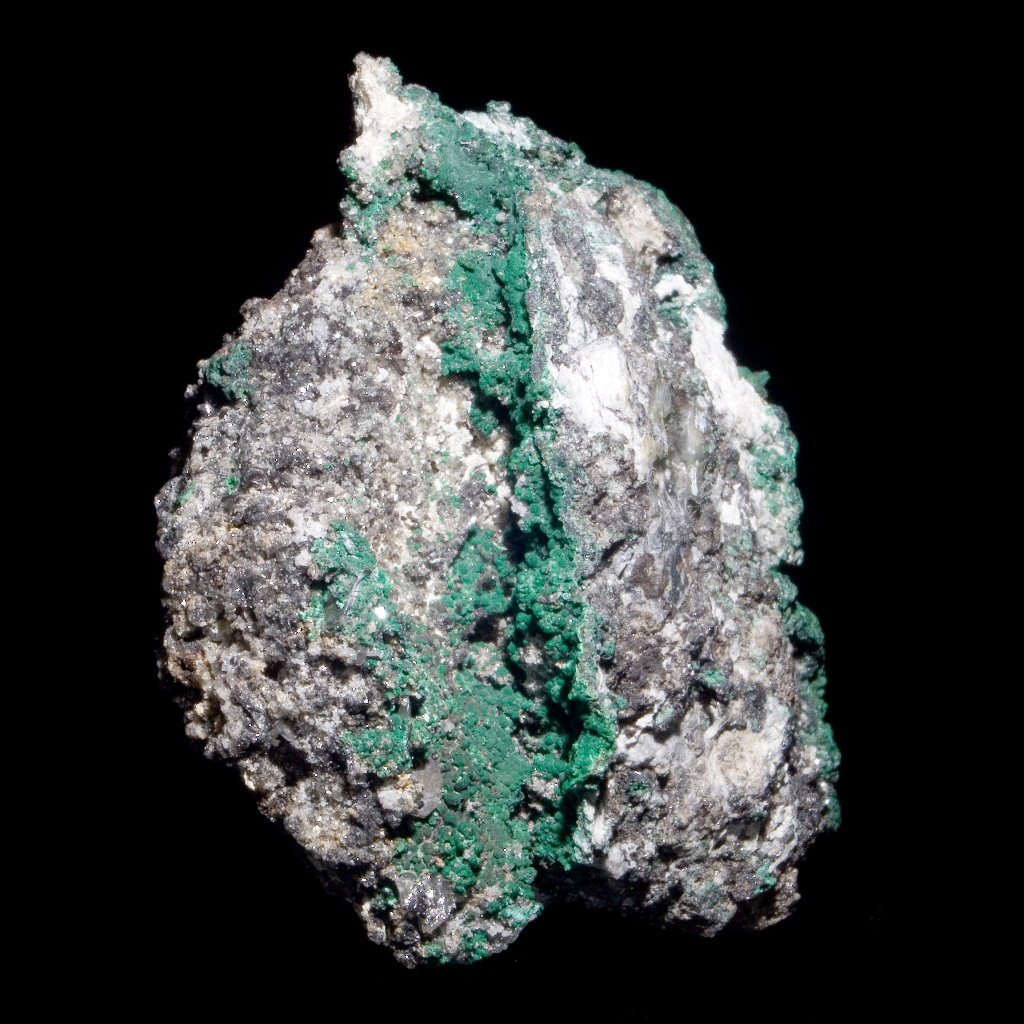 One side features Wulfenite, the other beautifully botryoidal Malachite running across a space. One partially dissolved cryst