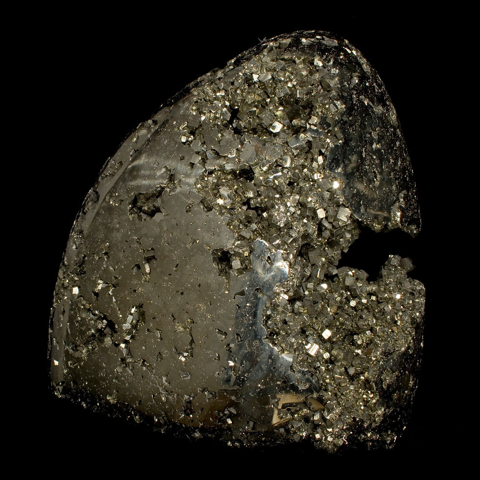 Thumbnail: A large sculptural Peruvian Pyrite freeform shaped to highlight complex internal spaces lined with cubic crystals of Pyrite.