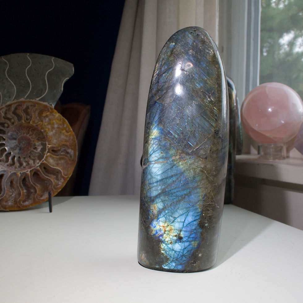 Thumbnail: Blue with highlights of Yellow are the dominant tones in this iridescent, hand polished Labradorite freeform from Madagascar.