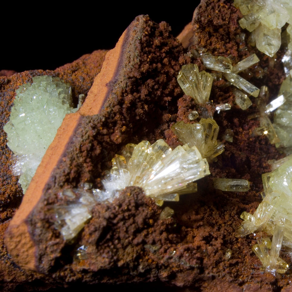 Thumbnail: A variety of gemmy terminated Adamite crystals across two distinct spaces within the Limonite matrix. The limonite matrix fra