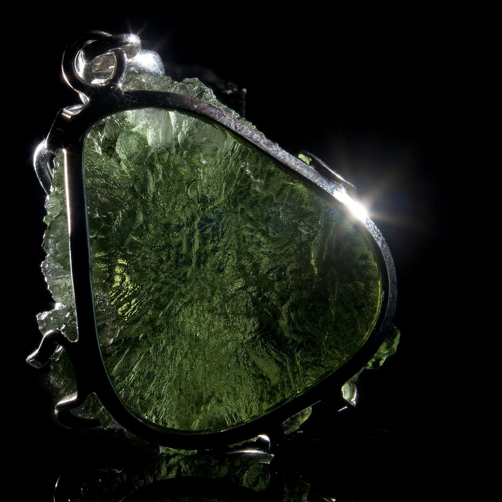 Thumbnail: Moldavite is the naturally water-etched result of a meteoritic impact in southern Germany that occurred about 14.7 million ye