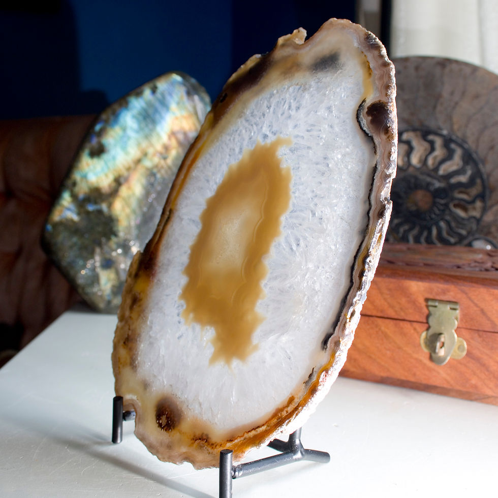 Agate, Nature's Stained Glass! Particularly picturesque thin, translucent banded Agate, stand included for an optimal display