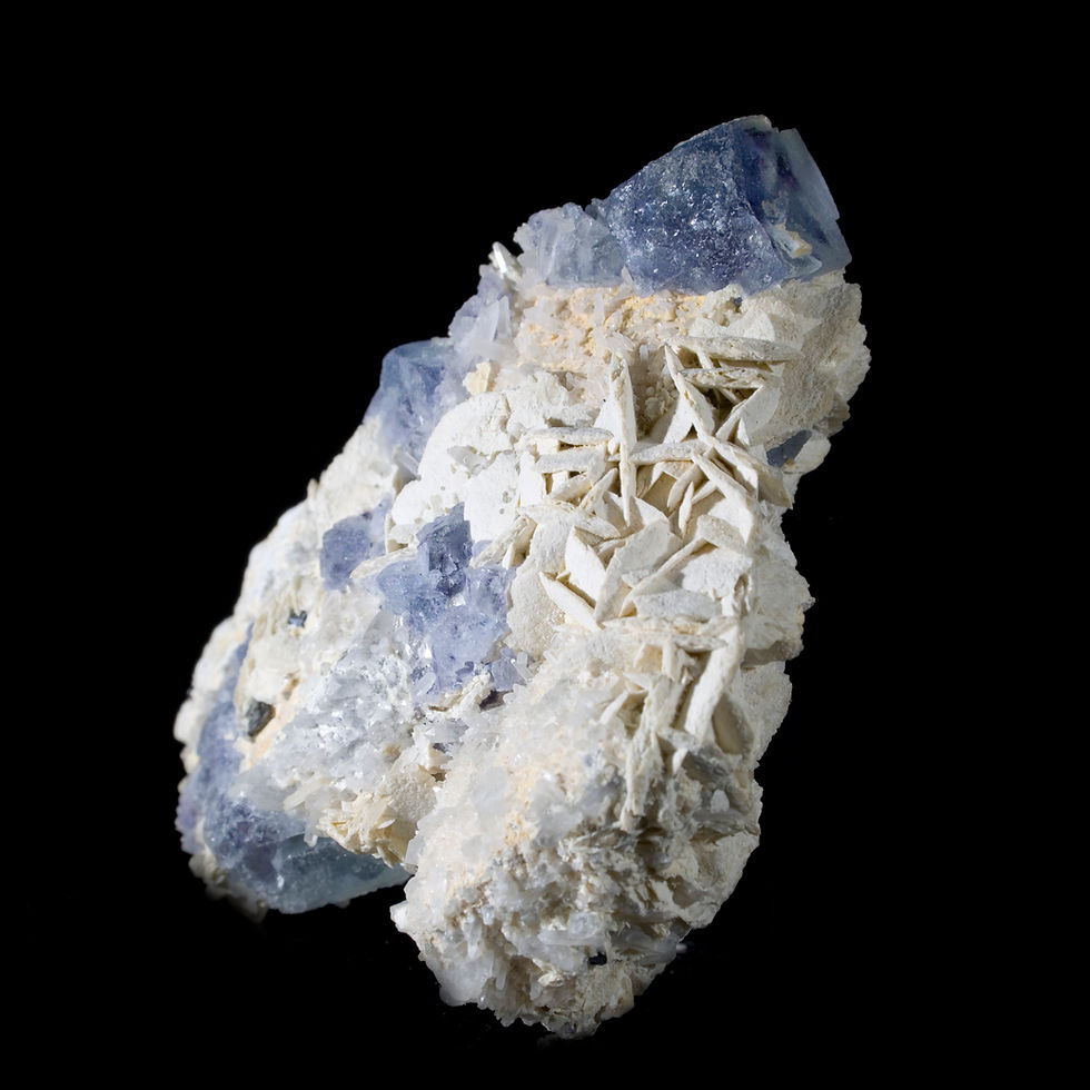 Thumbnail: Complex crystals of Fluorite are accompanied by a series of small scepters of Quartz.